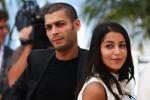 Adel Bencherif en compagnie de Leila Bekhti, sur la croisette, � l'occasion de la pr�sentation de Un Proph�te (2009) de Jacques Audiard, au 62eme Festival de Cannes, le 16 Mai 2009
